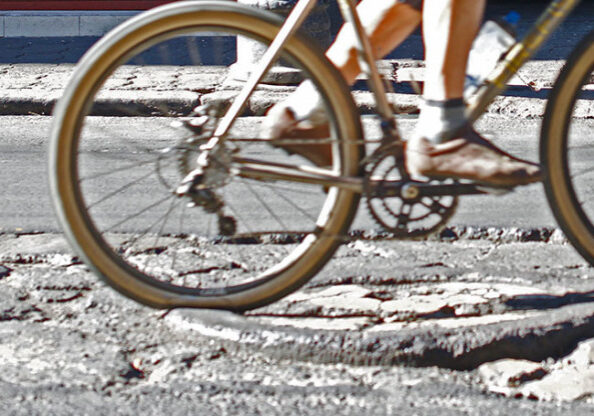 Close view of a man legs pedaling bicycle